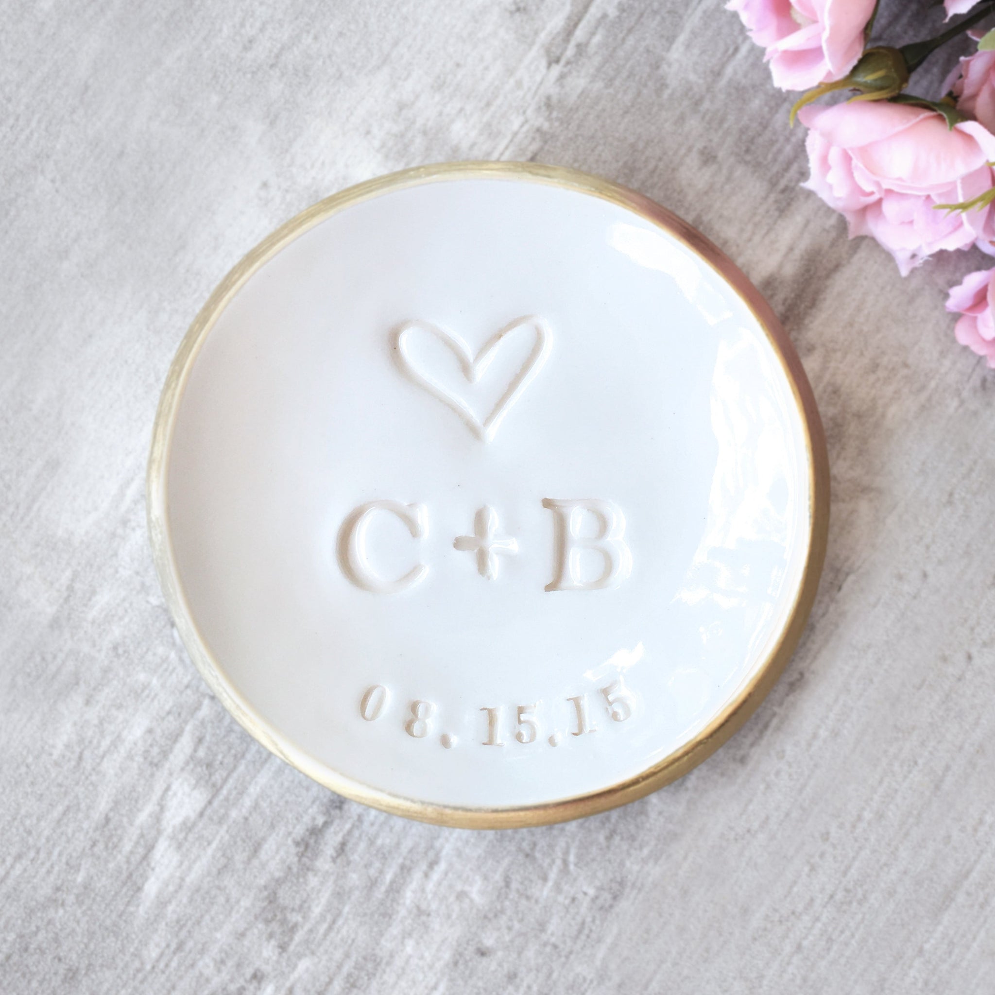 classic white ceramic handmade clay bowl with gold trim, wedding ring dish with stamped initials, a heart and a date, custom hand engraved heart and date. Unique spouse anniversary gift for husband & wife jewelry holder, newlyweds ceremony keepsake future mrs and bride to be bridal shower gifts