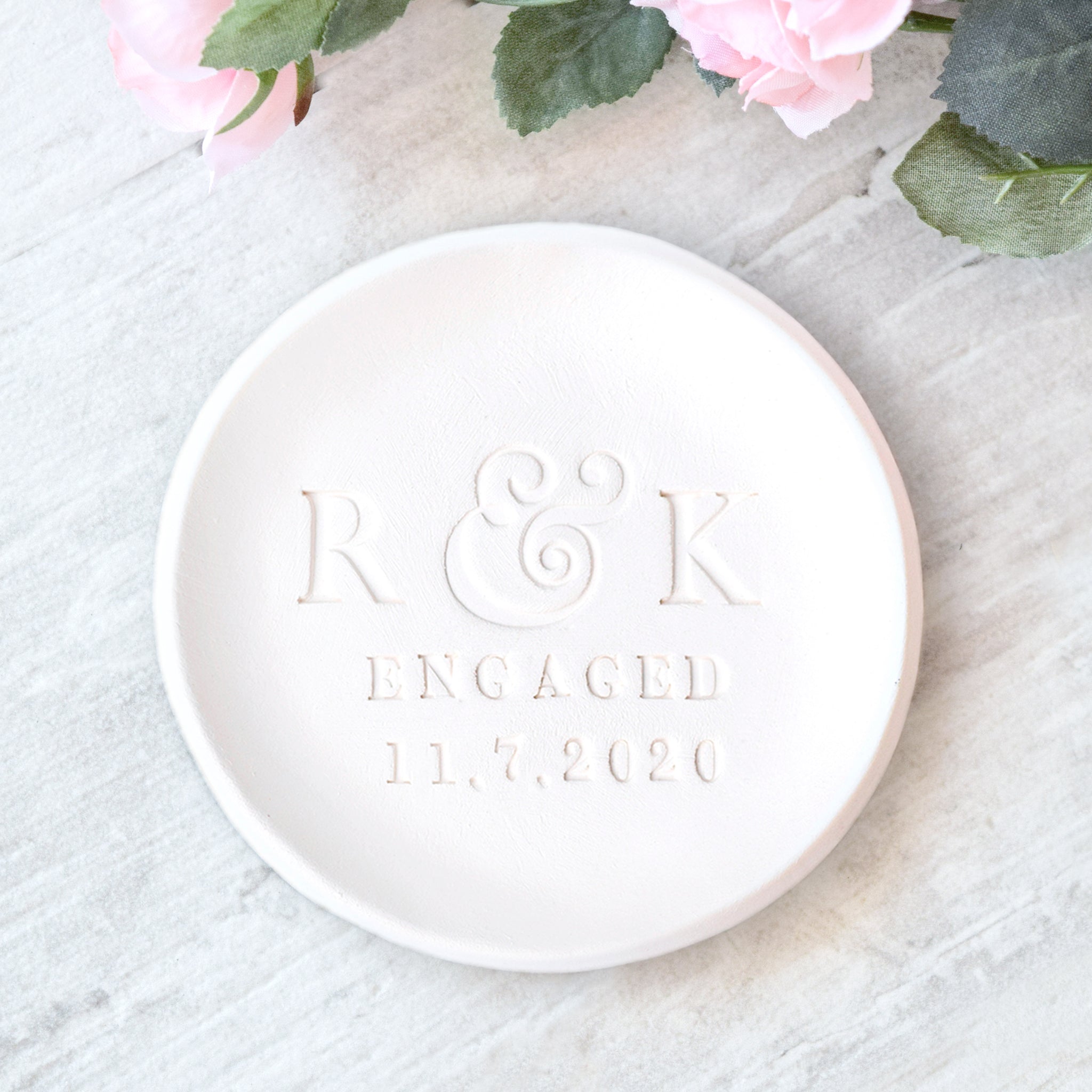 custom engagement ring dish personalized pottery engaged couple gift, classic minimalist white gloss ceramic bowl, hand engraved couples 2 name initial letters, word engaged and date future daughter in law proposal gift