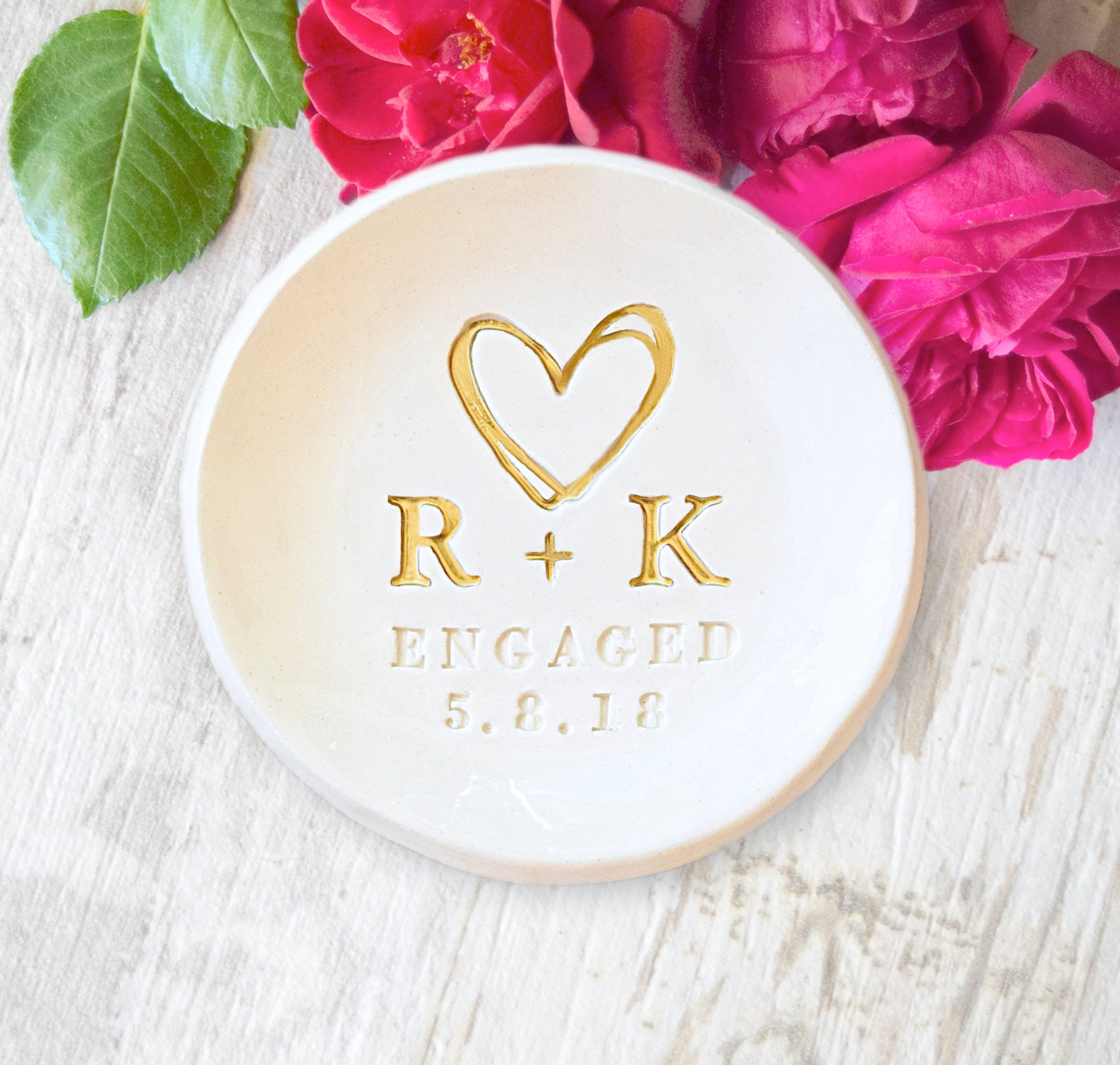 handmade ceramic ring dish personalized ring holder engagement gift, features hand engraved date, gold heart and 2 name initial letters, custom bride to be proposal gift