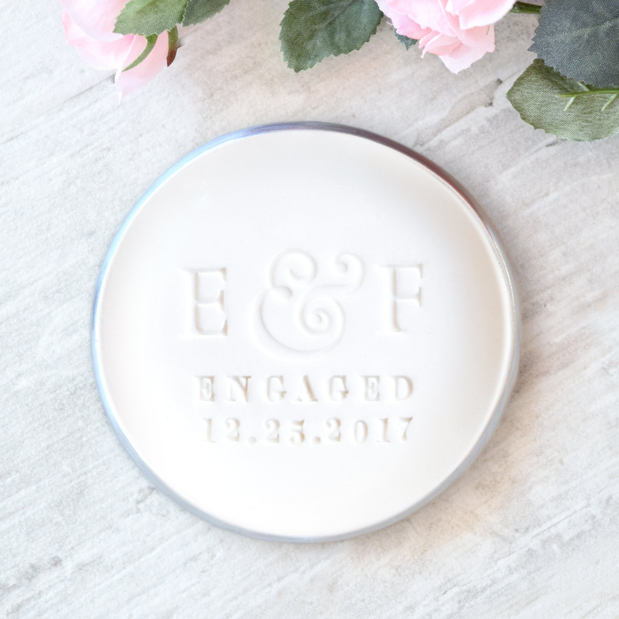 custom engagement ring dish personalized pottery engaged couple gift, classic silver rim white gloss ceramic bowl, hand engraved couples 2 name initial letters, word engaged and date future daughter in law proposal gift