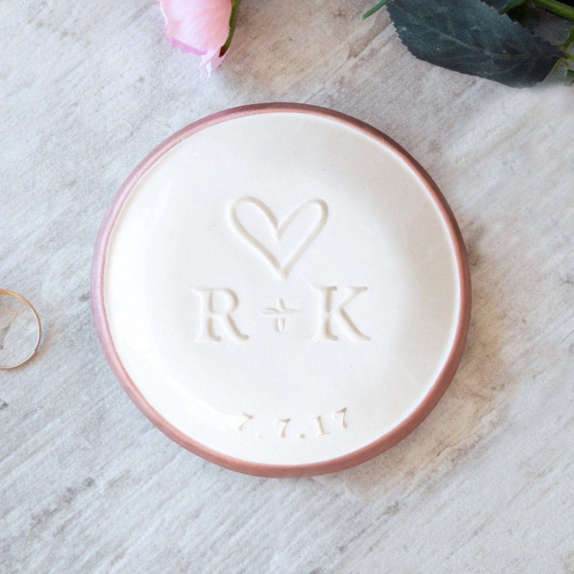 handmade ceramic wedding ring dish with initials and date, custom hand engraved heart and date, modern rose gold trim white bowl, spouse anniversary gift for husband & wife jewelry holder, newlyweds ceremony keepsake future mrs and bride to be bridal shower gifts