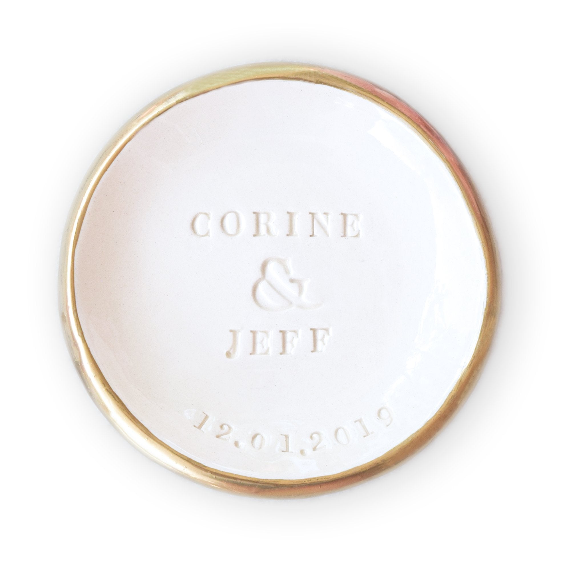 handmade ceramic ring dish features embossed names and date, hand painted gold trim white gloss finish bowl, classic home decor, personalize wedding ring holder couples wedding gift and heirloom anniversary keepsake.  